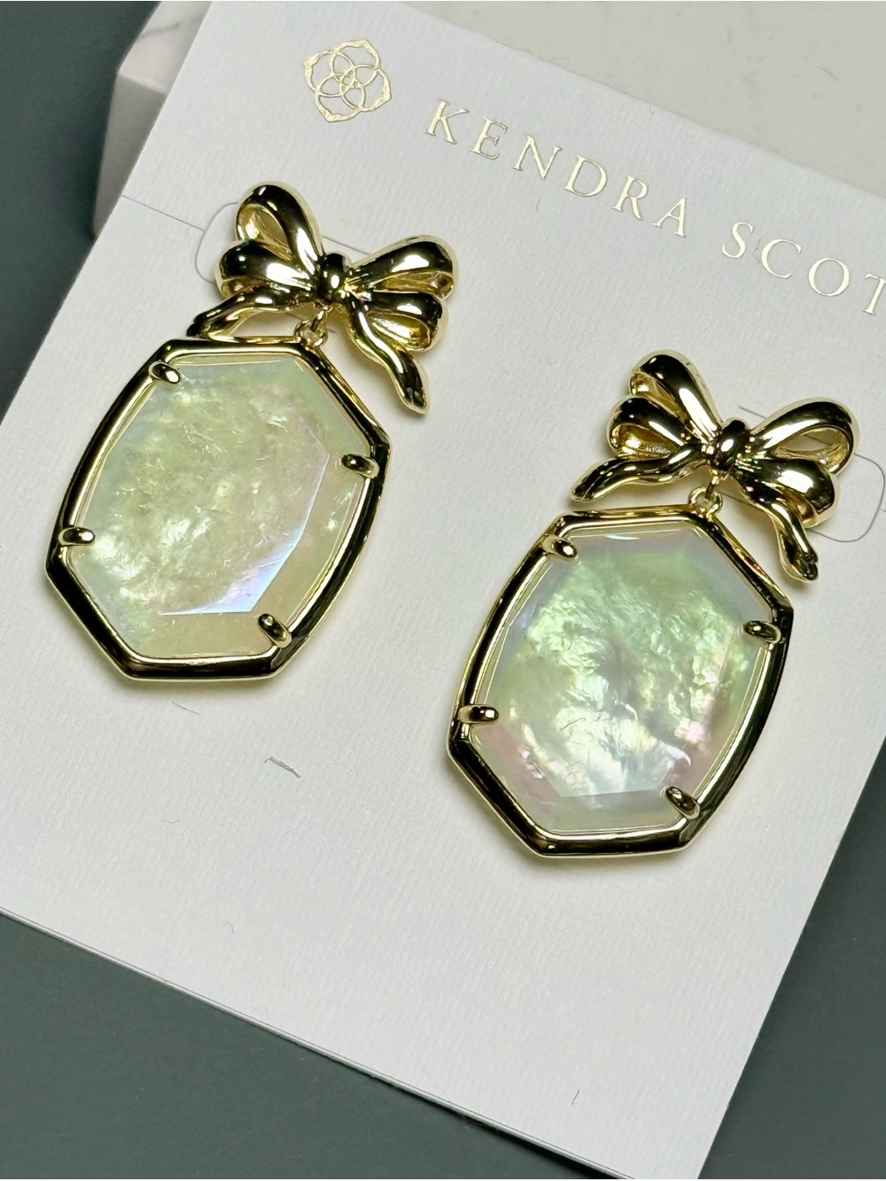 Kendra Scott Daphne Gold Bow Earrings in Iridescent Crystal Ivory Illusion - Picture 2 of 3